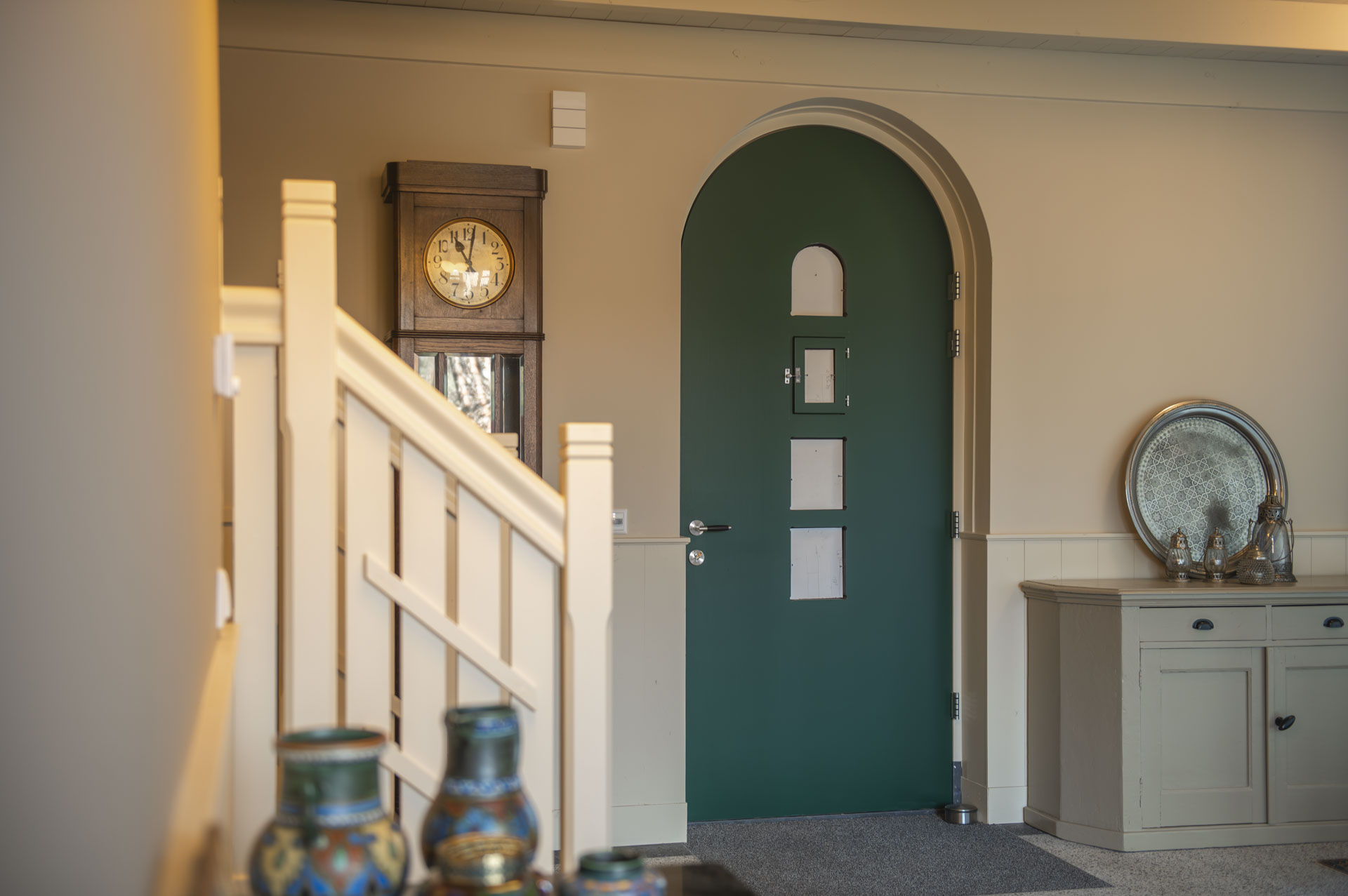Wandafwerking bij de entree van Villa Hulshorst